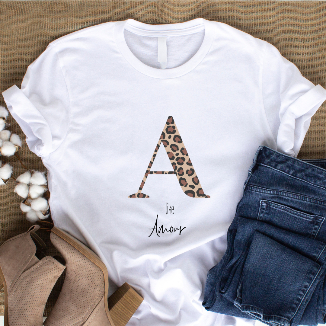 A like amour white tshirt with initial leopard