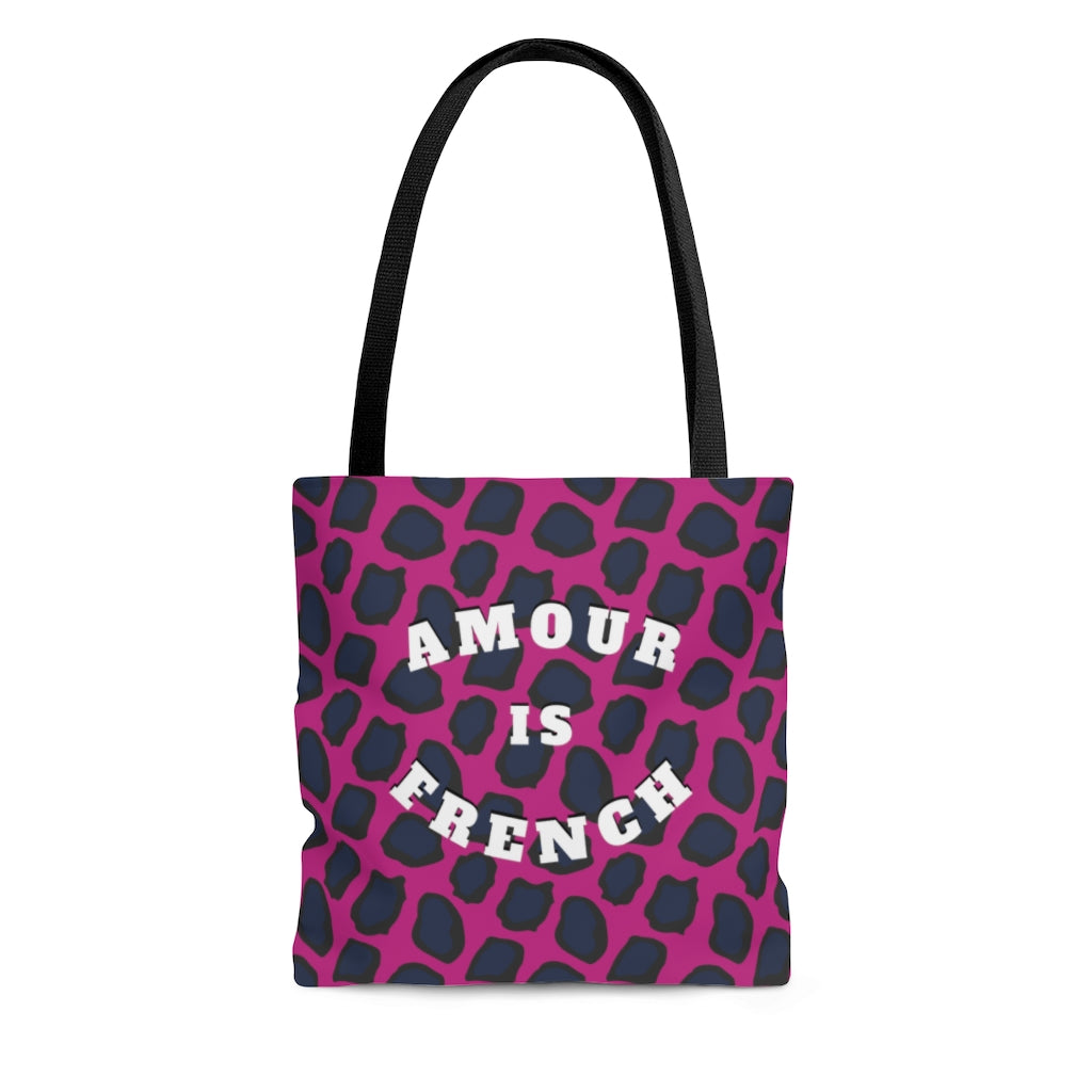 This wear-everywhere tote brings color to your look. Its shoulder-length top handles make for easy transport. Send the world a happy message ... in French! Whether carrying your everyday essentials or your favorite bottle of (french) wine, cheese or baguette!