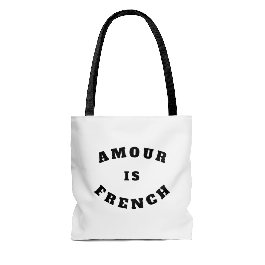 This wear-everywhere tote brings color to your look. Its shoulder-length top handles make for easy transport. Send the world a happy message ... in French! Whether carrying your everyday essentials or your favorite bottle of (french) wine, cheese or baguette!