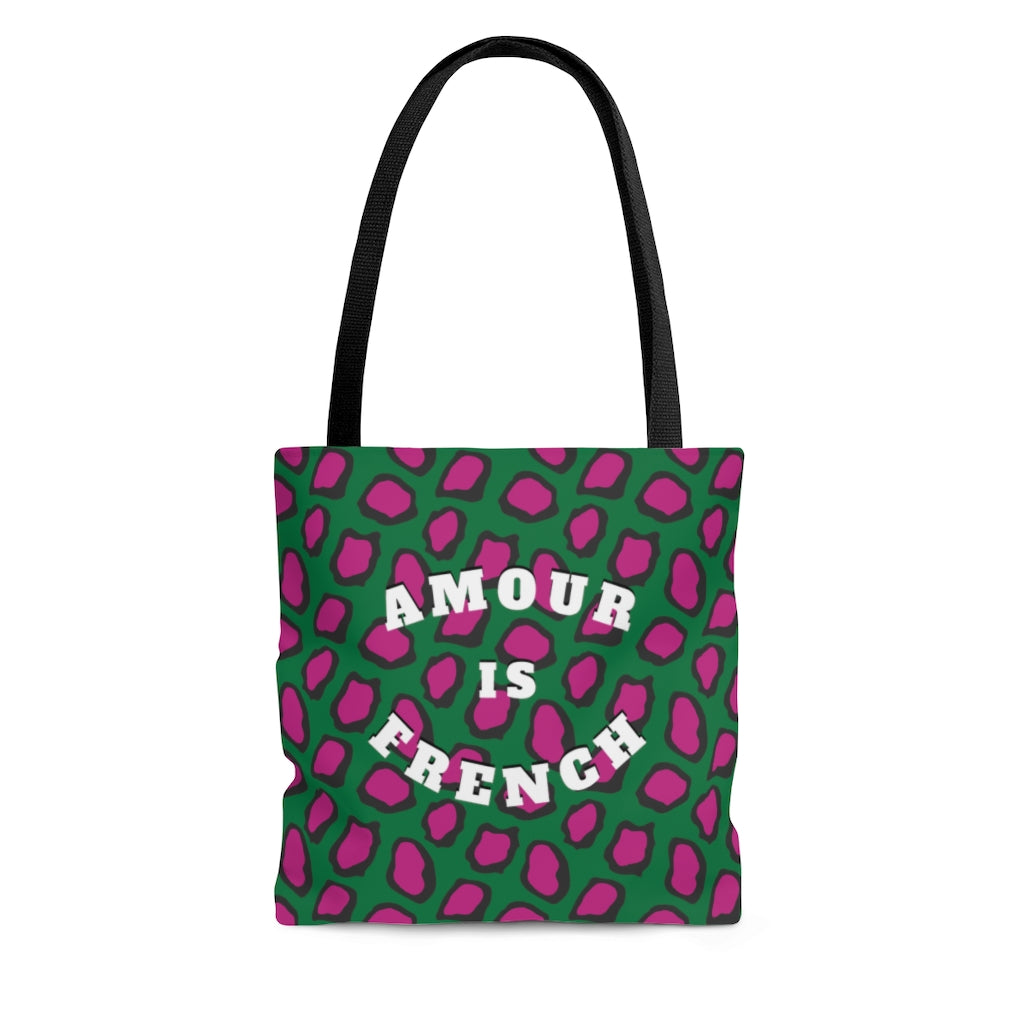 This wear-everywhere tote brings color to your look. Its shoulder-length top handles make for easy transport. Send the world a happy message ... in French! Whether carrying your everyday essentials or your favorite bottle of (french) wine, cheese or baguette!