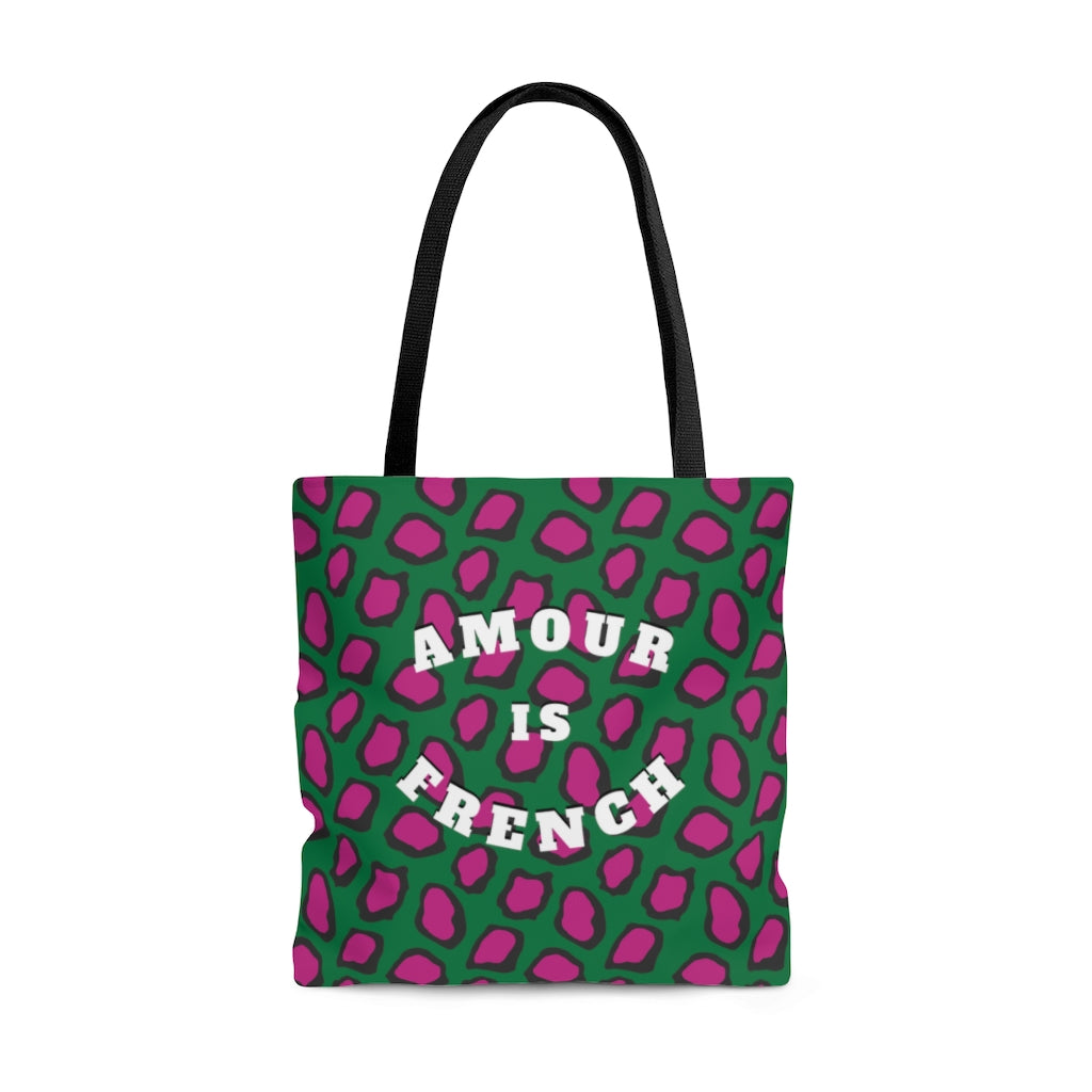 This wear-everywhere tote brings color to your look. Its shoulder-length top handles make for easy transport. Send the world a happy message ... in French! Whether carrying your everyday essentials or your favorite bottle of (french) wine, cheese or baguette!