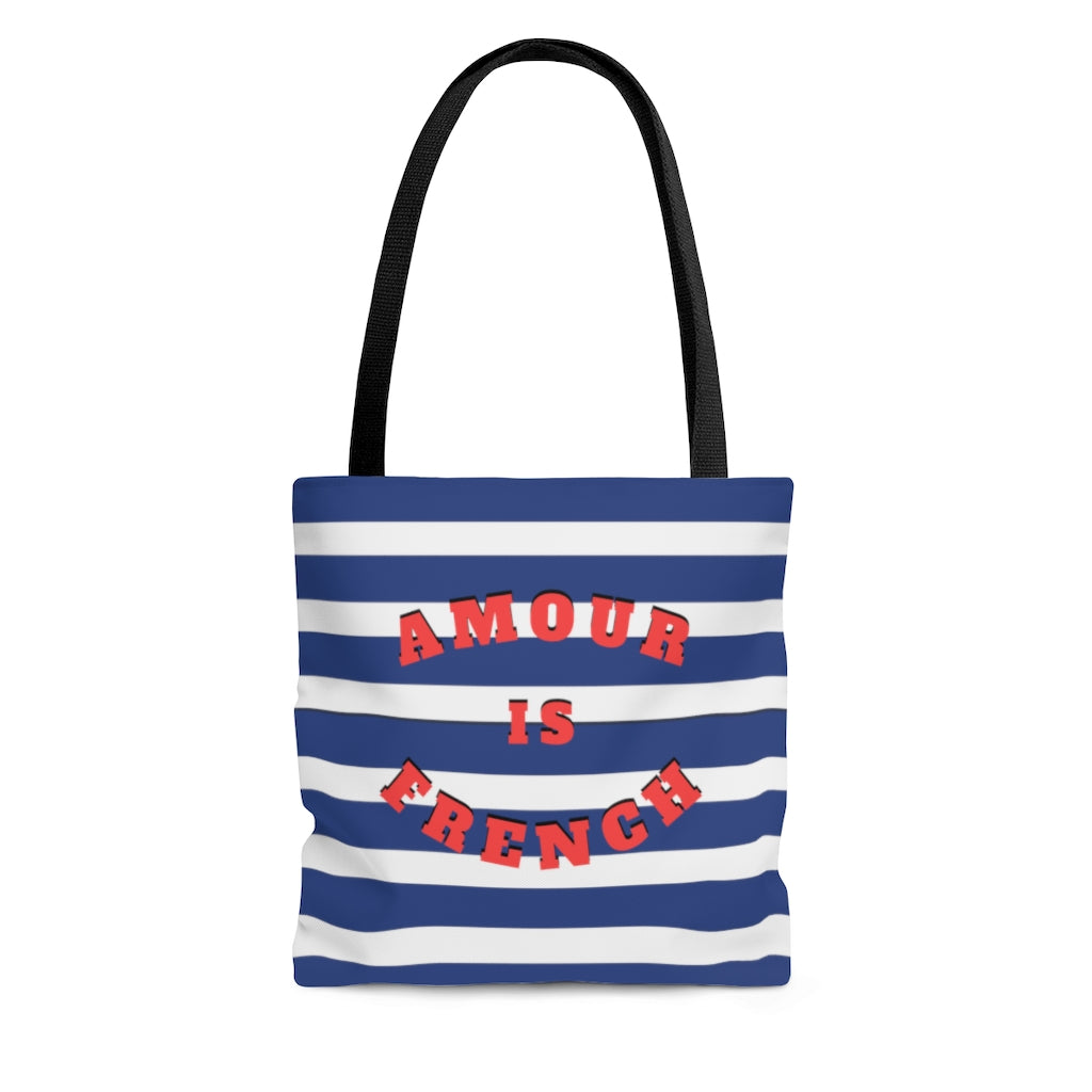 This wear-everywhere tote brings color to your look. Its shoulder-length top handles make for easy transport. Send the world a happy message ... in French! Whether carrying your everyday essentials or your favorite bottle of (french) wine, cheese or baguette!